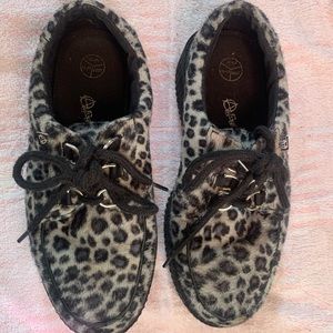 A little beat up 5.5, 6, Anarchi gray cheetah print platforms by TUK shoes.